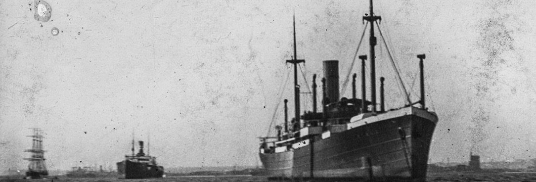 Black and white photo of a ship on the ocean