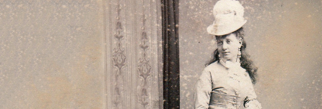 Photograph of a woman in a hat from 1875