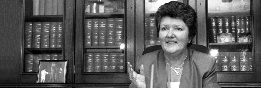 Black and white photograph of Joan Kirner at her desk