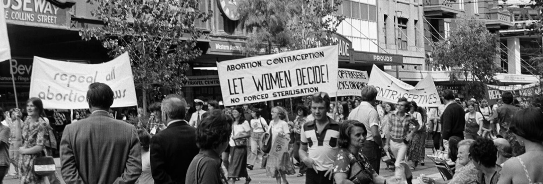 black and white photo of a protest in action