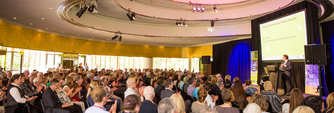 Photo of the arts centre filled with an audience