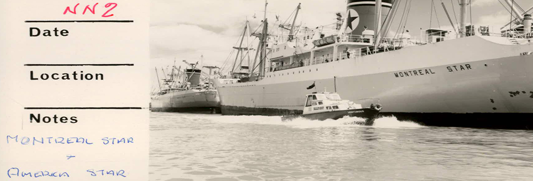 Black and white image of cruise boat. 