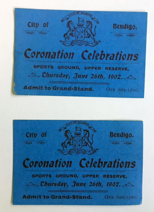 blue tickets saying coronation celebrations thursday june 26th 1902. Sports Ground Upper Reserve. city of Bendigo. Admit to Grand Stand. One shillling.