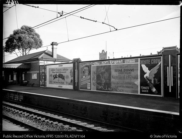 black and white photograph of a billboard