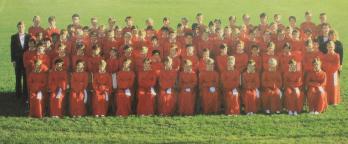 National Boys Choir photo of the choir lined up in their red uniforms
