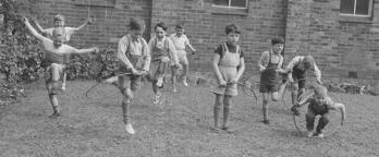 boys playing with hula hoops