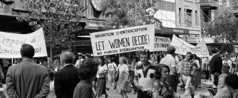 Women's liberation march in Melbourne 1979 SLV black and white photo of a protest in action