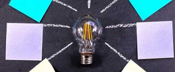 light bulb and post its
