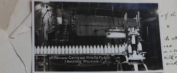 VPRS 794/P0 Box 1099, 26/5231 photo of milk on a conyerer belt