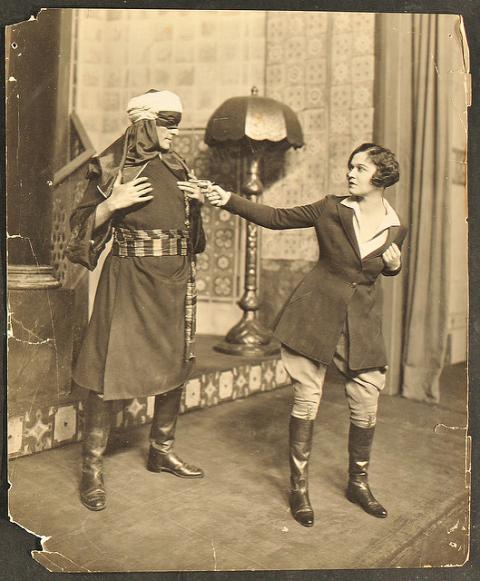 two people performing on stage