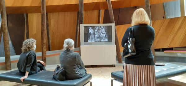 people watching a visual display