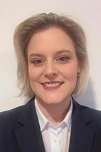 a woman smiling at camera